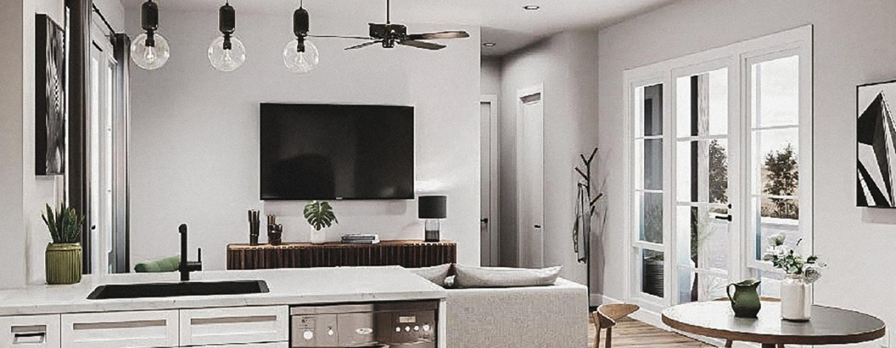 a kitchen with a tv and a couch