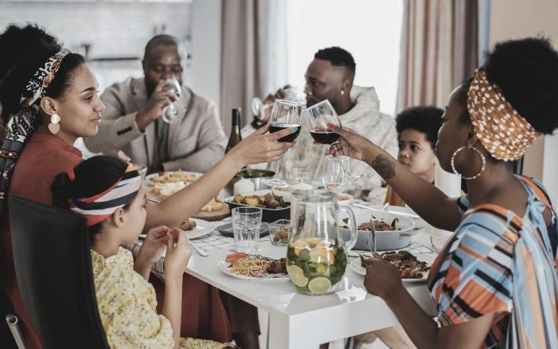 a group of people eating at a table