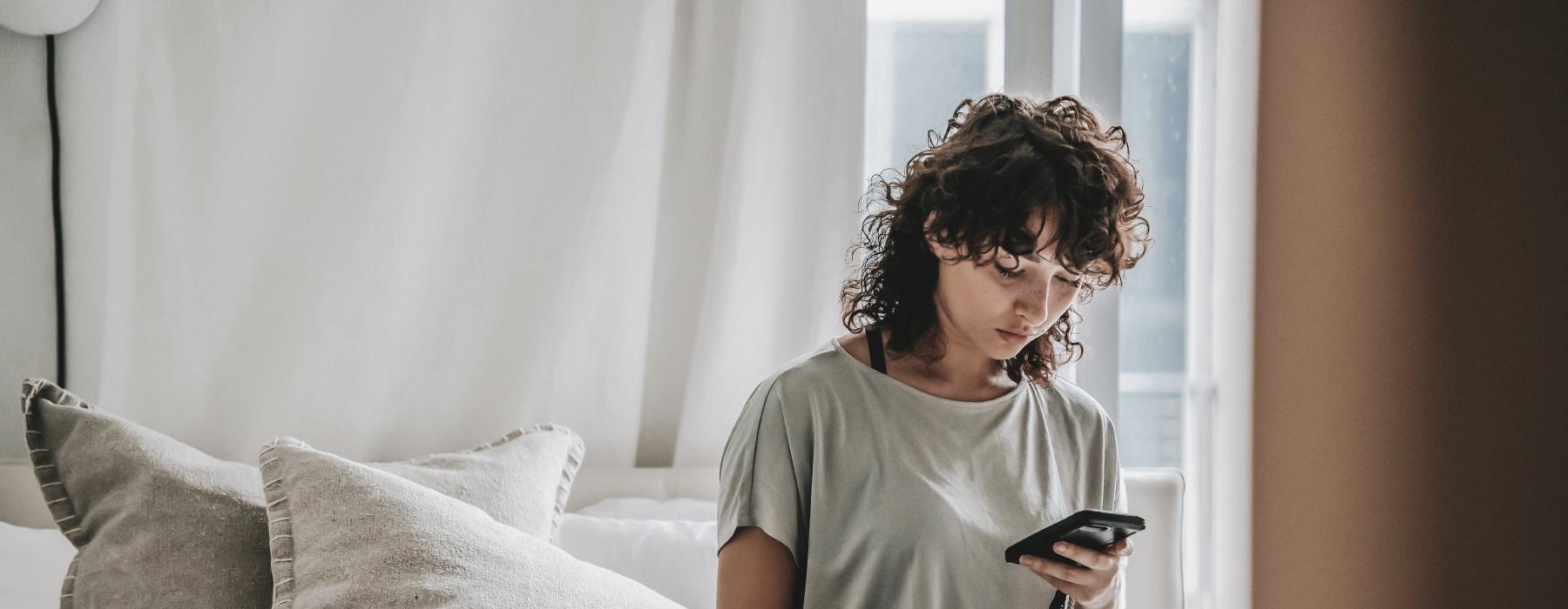 a person sitting on a bed