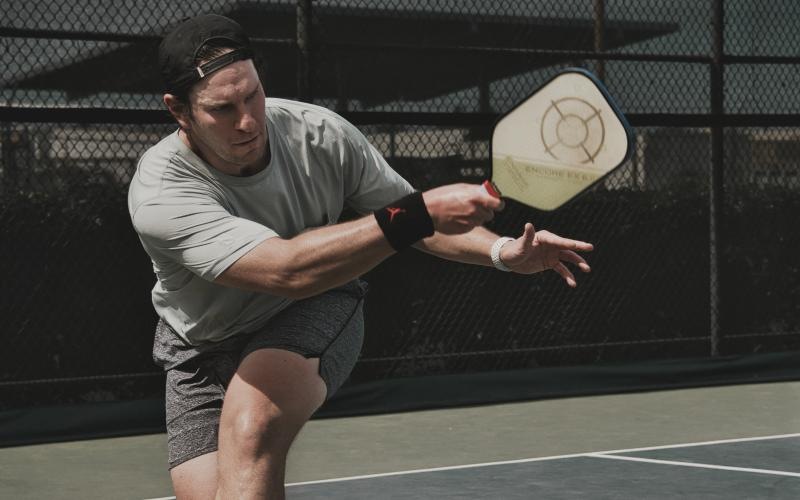 a man playing tennis