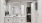 a bathroom with white cabinets