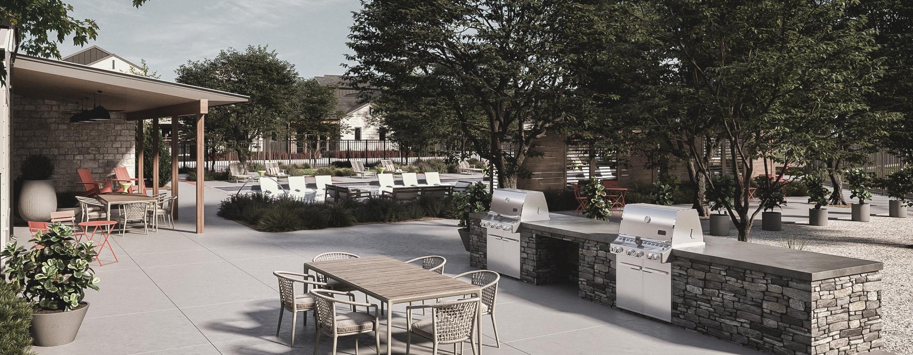 a patio with tables and chairs and trees
